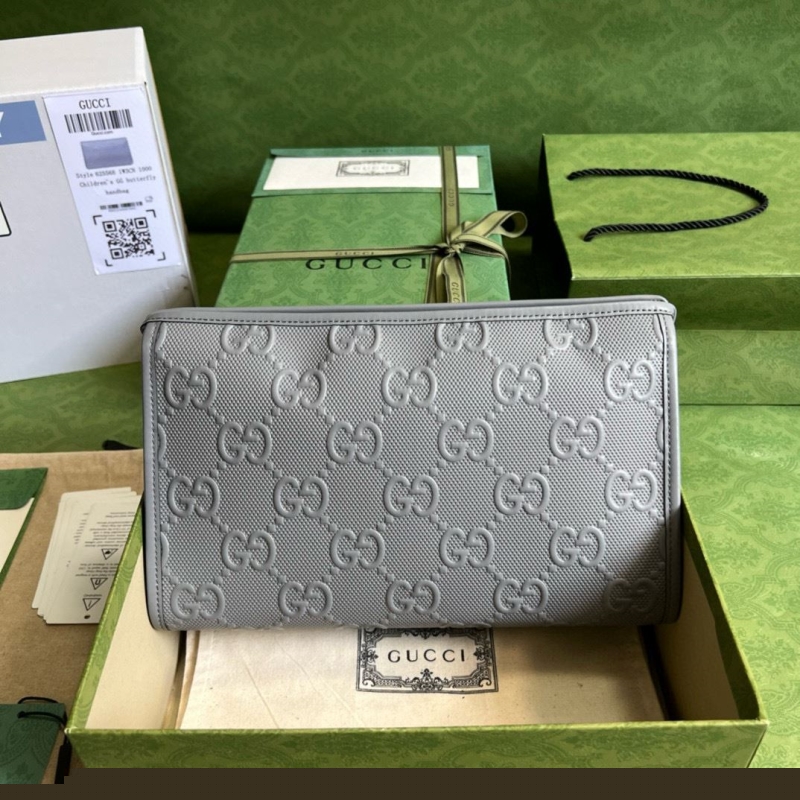 G*u*i clutch bags
